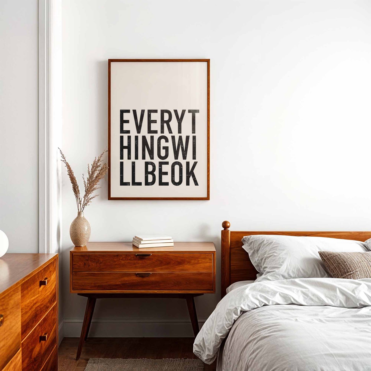 Dark wood framed positive quote print "Everything Will Be Ok" in mid century styled bedroom.