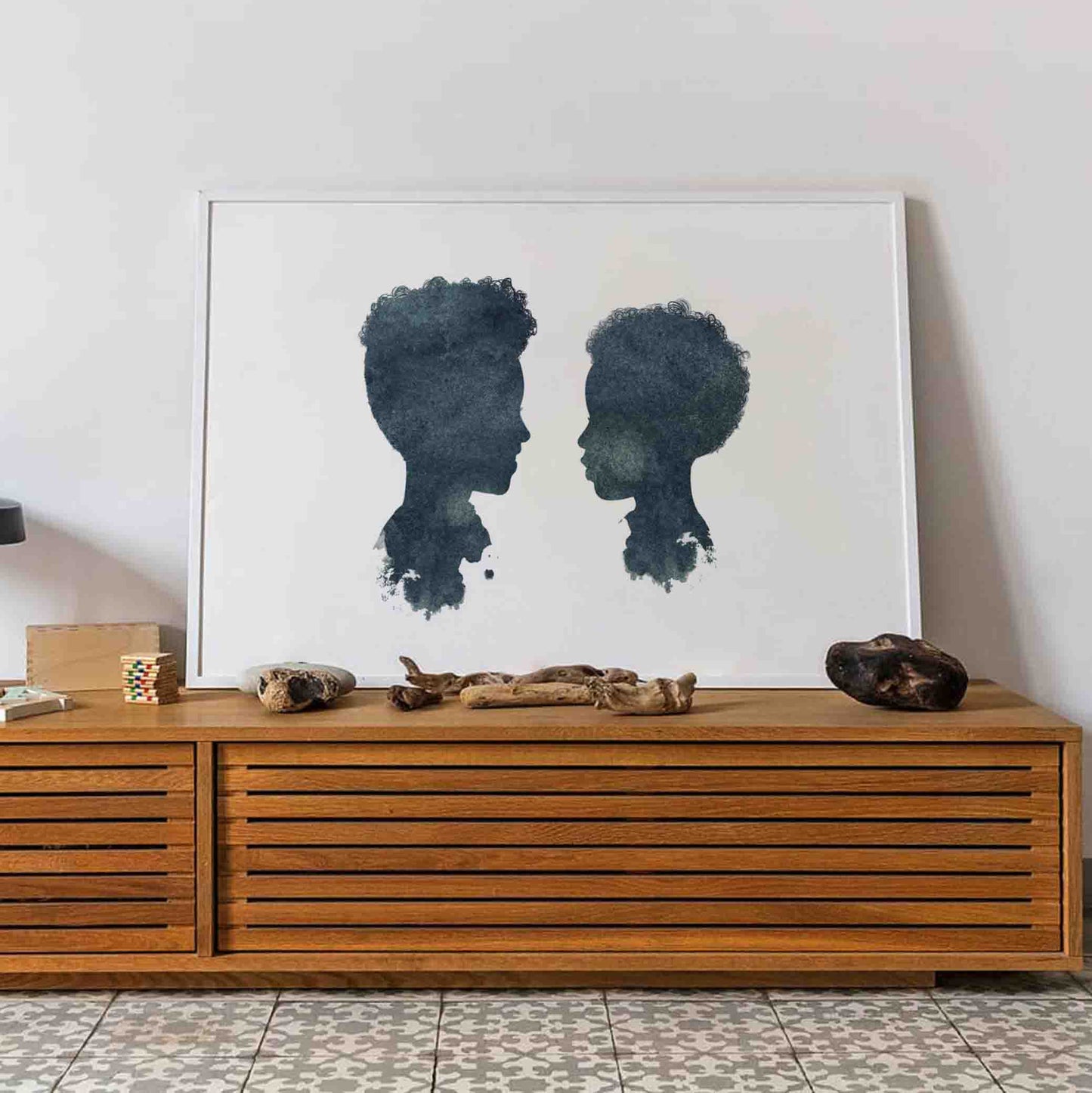 Silhouette portrait of two siblings – custom illustrated artwork from Burnt Peach, made to last a lifetime.