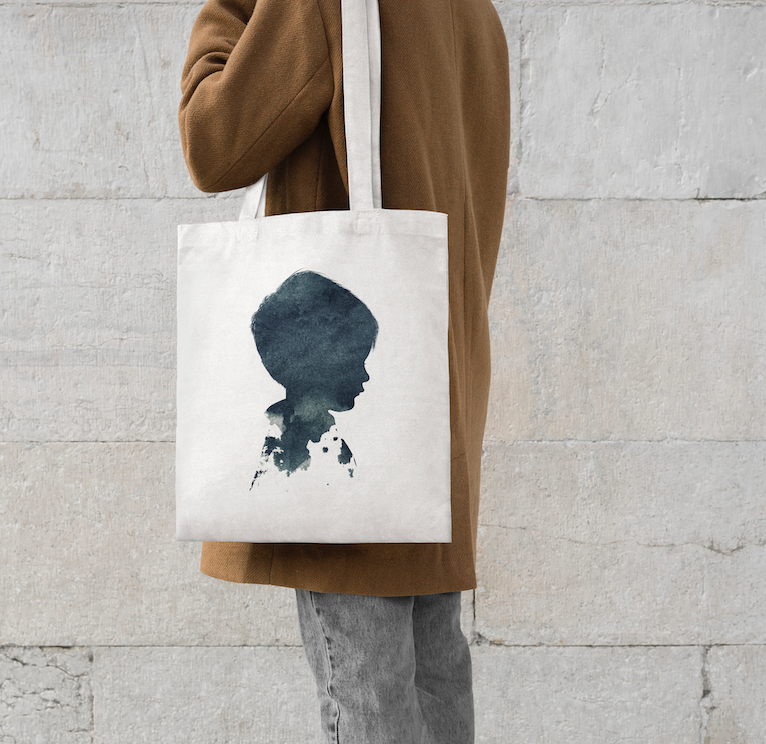 Custom digital portrait illustration printed on a tote bag, showing the versatility of our downloadable portrait files for gifts and accessories.