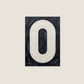 Letter O oil paint texture typography print on off white background
