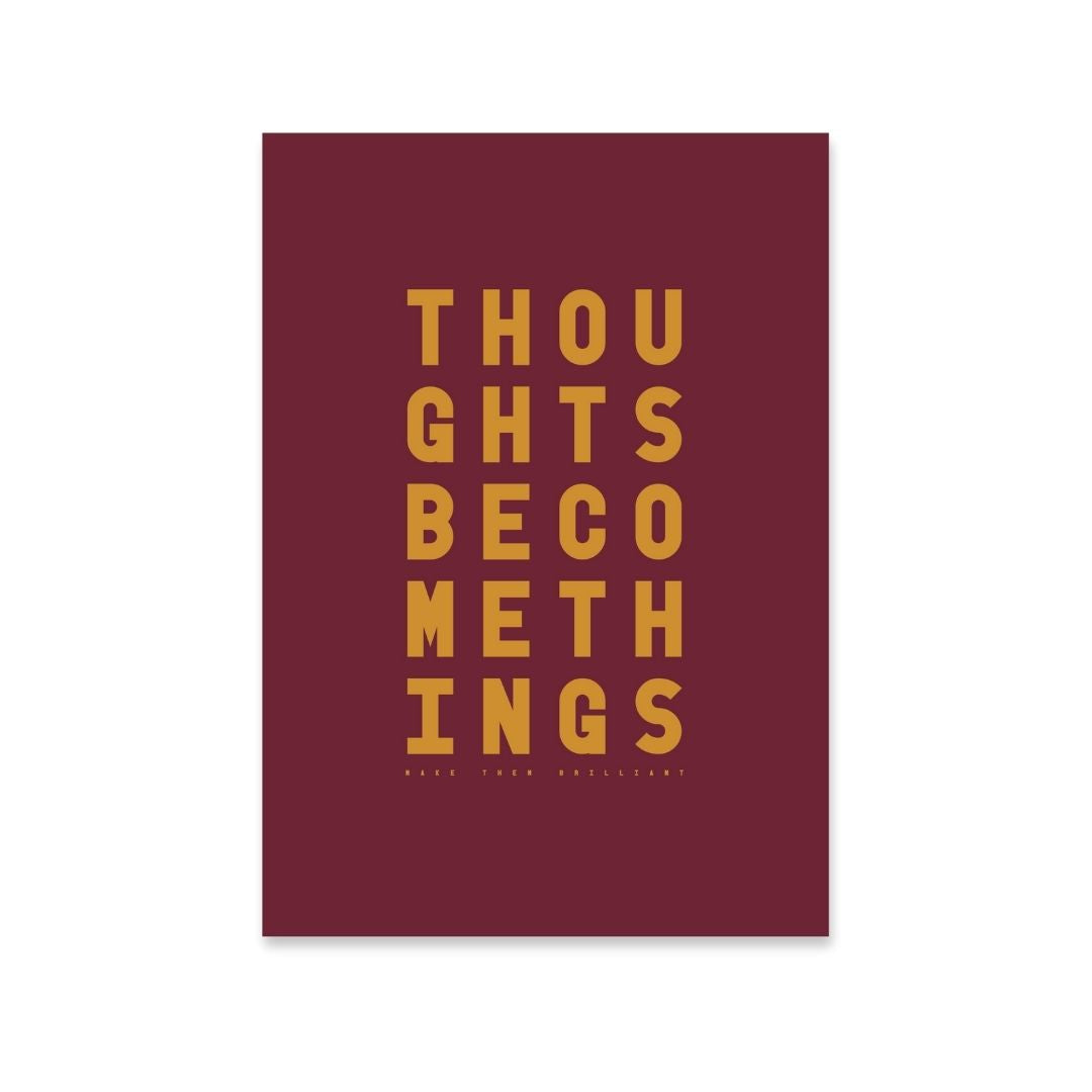 Minimal  typography print with the words “Thoughts become things, make them brilliant” displayed in bold type in burgundy and mustard.