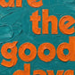 Close-up of textured oil-style typography showing thick brush strokes and layered paint detail in teal and orange. These are the good days quote. 