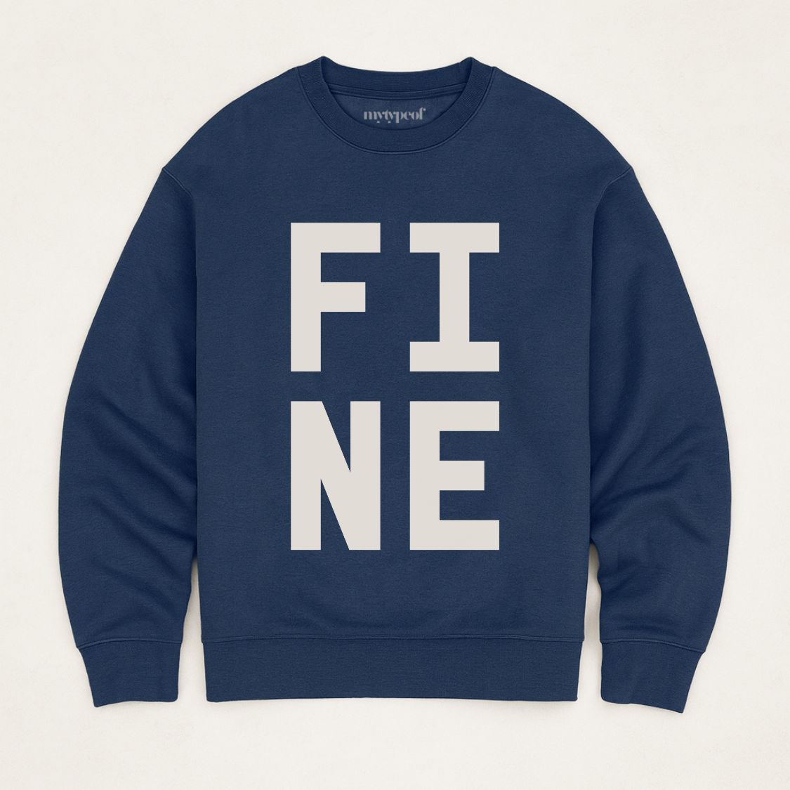 Navy bold typographic designed sweatshirt, with 'FINE' design. Unisex, oversized sweatshirt, photographed  as a flay lay on a plain background. 
