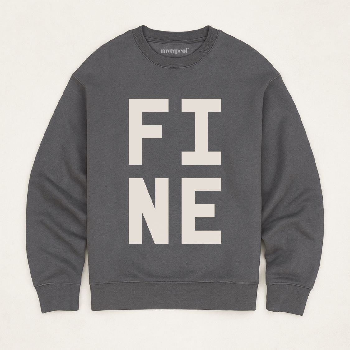 Iron Grey colour bold typographic designed sweatshirt, with 'FINE' design. Unisex, oversized sweatshirt, photographed  as a flay lay on a plain background. 
