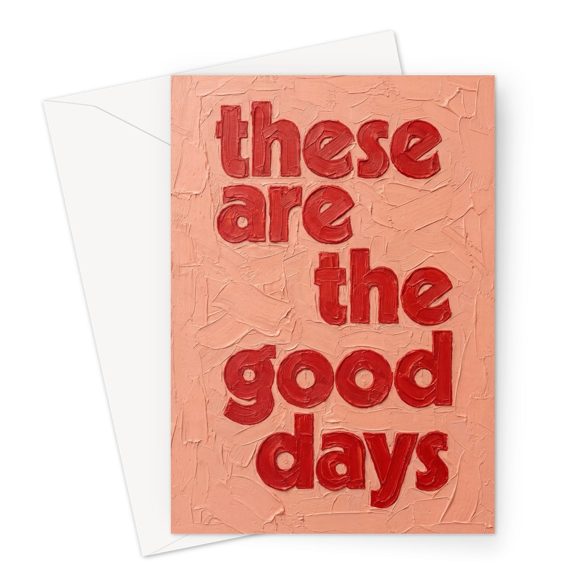 Greeting card design "these are the good days" painted in oil paints in pink and red tones
