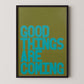 Good Things Are Coming modern typography poster in turquoise text on olive green background in black frame.