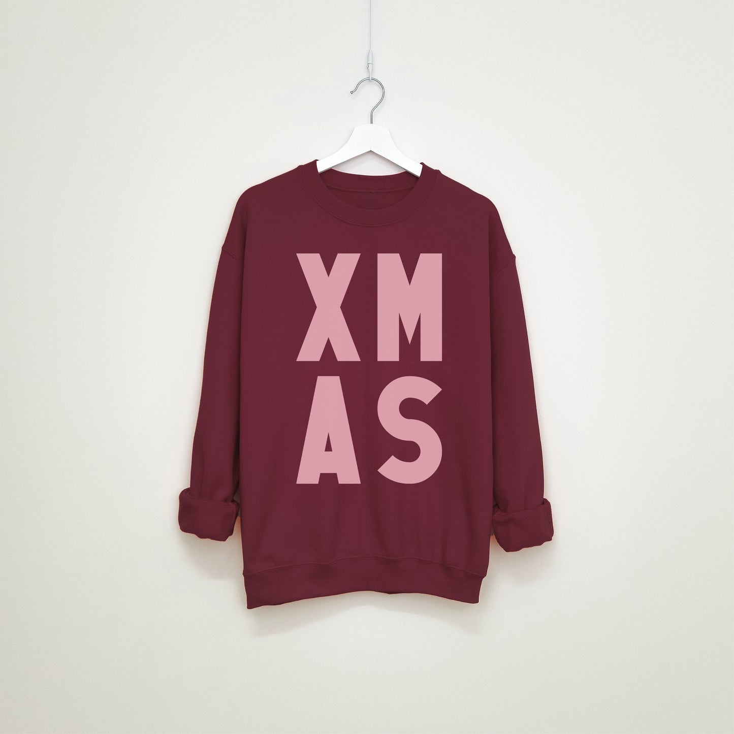 Burgundy and pink  bold graphic XMAS designed statement making Christmas sweatshirt, sustainable, unisex fashion. 