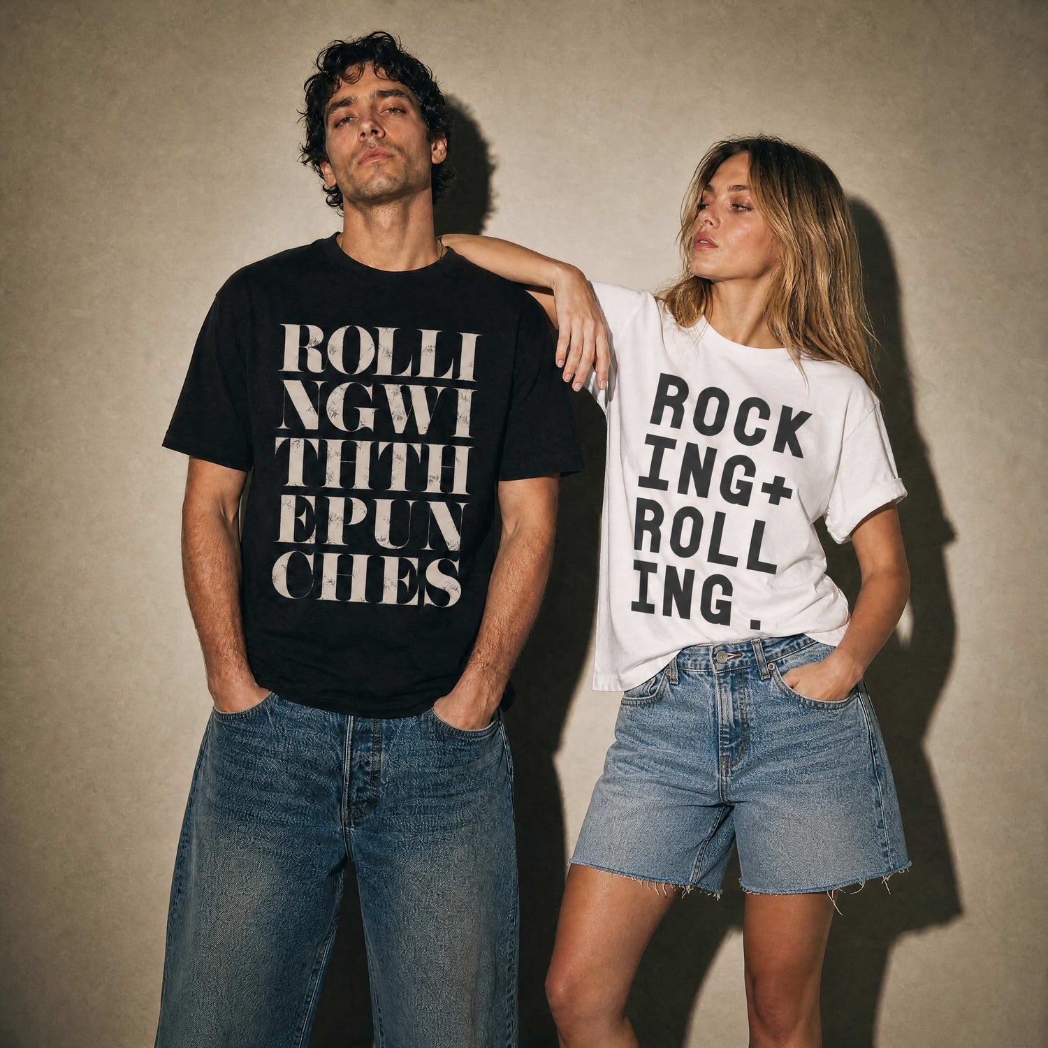 Man and woman wearing Burnt Peach typographic t-shirts, Rolling With The Punches and Rocking and Rolling slogan prints