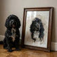Black cockapoo dog sat next to it's oil painted portrait in a vintage wood frame. 