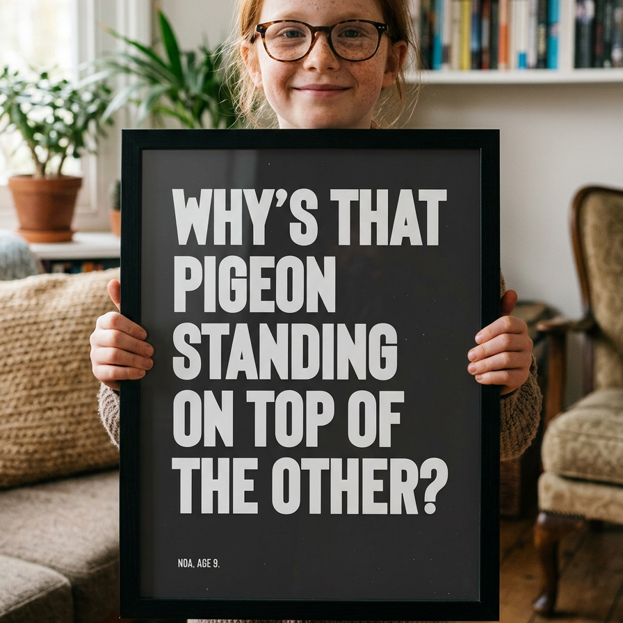 Girl with glasses holding her custom bold quote print in a black frame.  