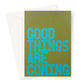 Good things are coming, greeting card with green and blue bold typography. 