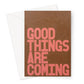Good things are coming, greeting card with brown and peach  bold typography. 