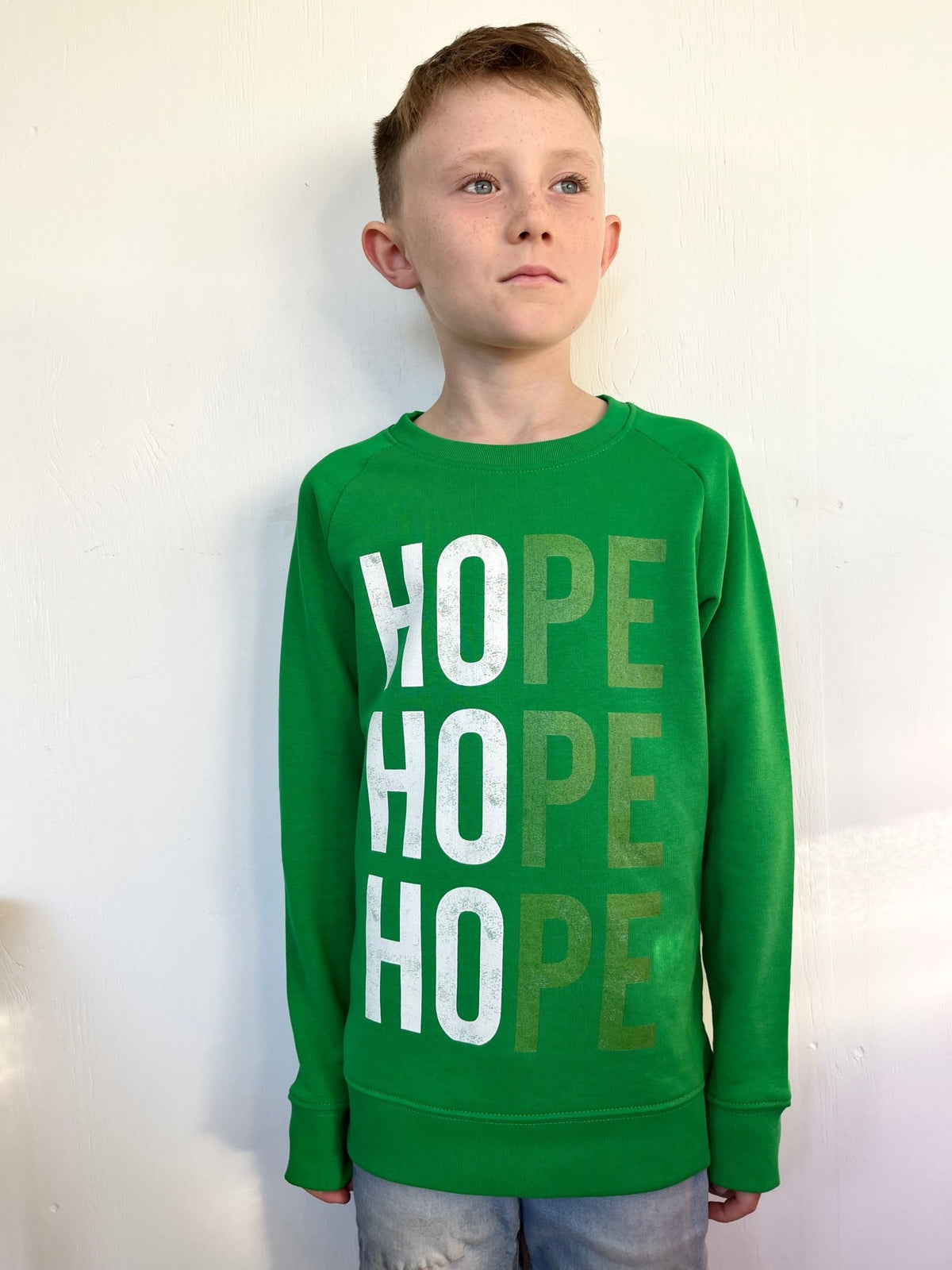HOPE Organic Christmas Jumper - Kids - Elf Green - Studio Stock - burnt peach.